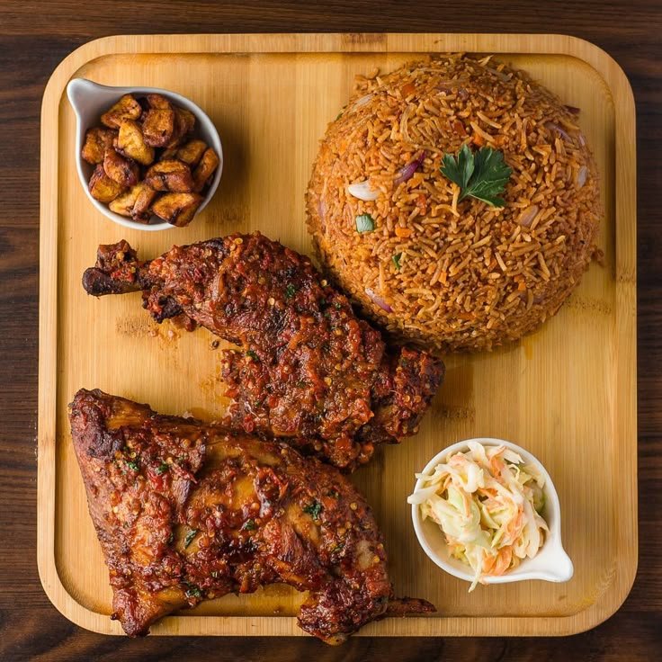 Jollof rice, grilled chicken, salad and plantain